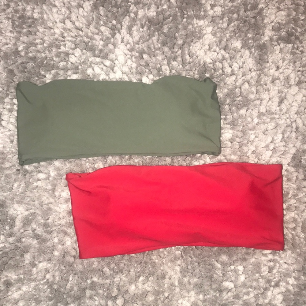 Two strapless bikini tops